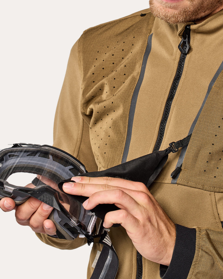Chest pocket with goggle wipe
