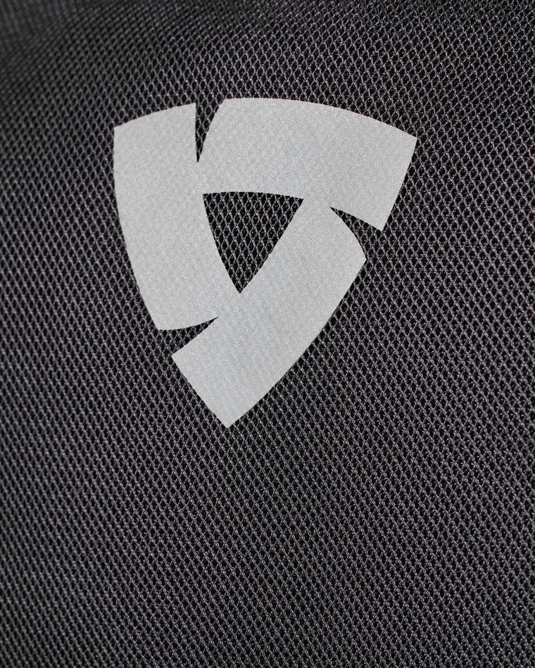 Laminated reflective logo on back