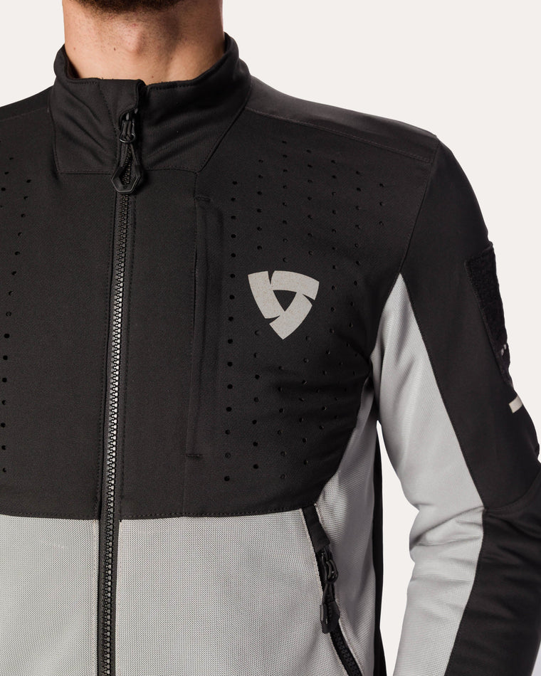 Laminated reflective logo on chest